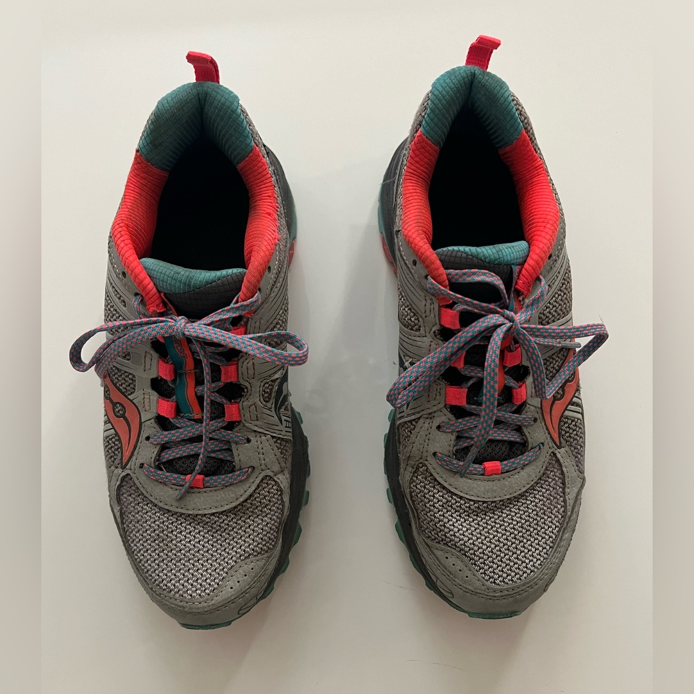 Grey, teal, and salmon colored workout shoes